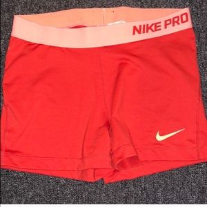 Two pair of nike Pros